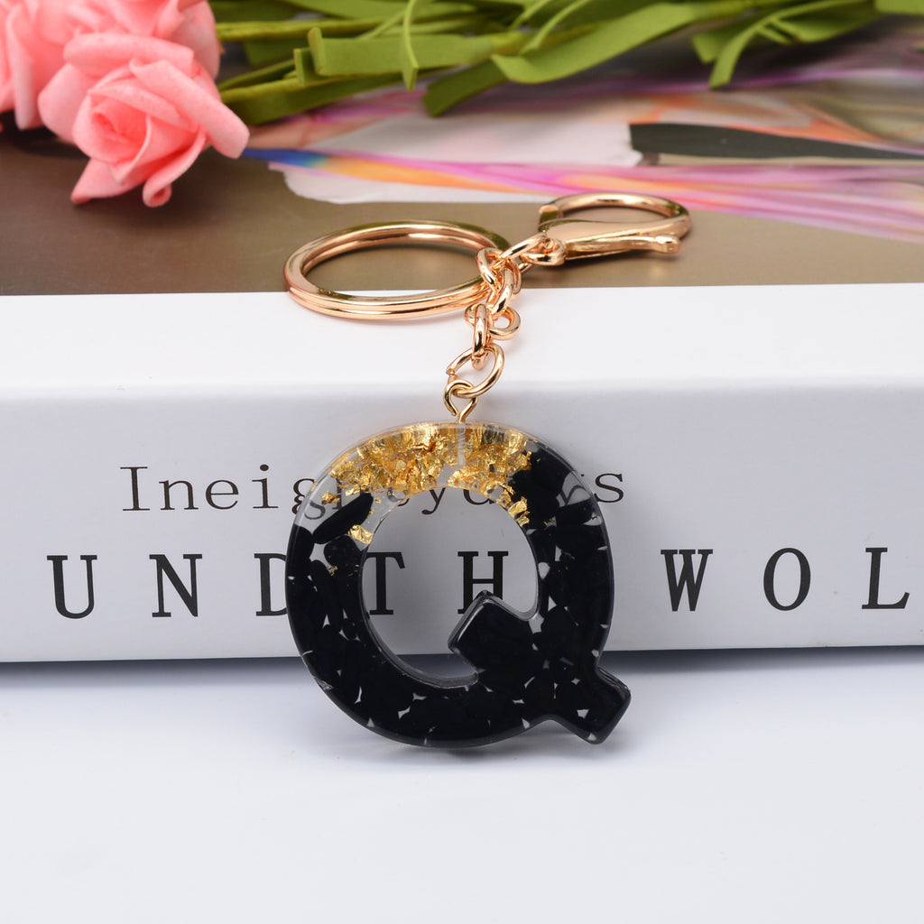 Carsine Black Pompom 26 Alphabets Keychain gold / Q
