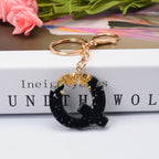 Carsine Black Pompom 26 Alphabets Keychain gold / Q